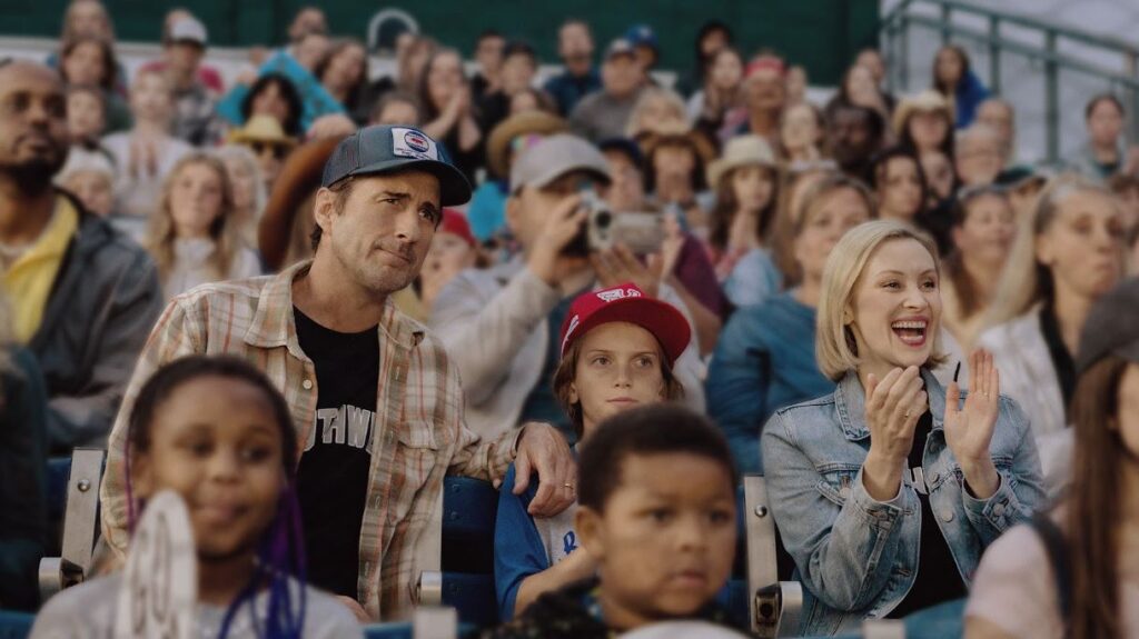 People are watching a baseball game in the film You Gotta Believe