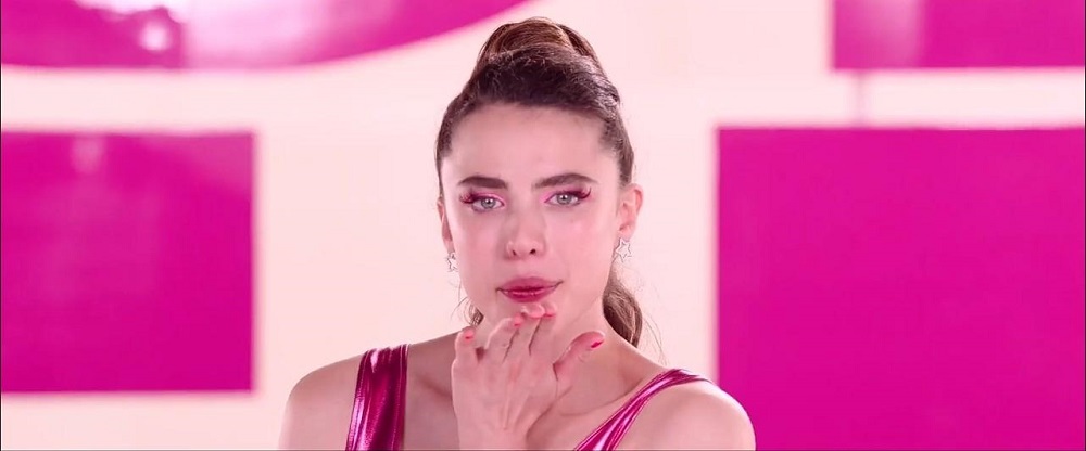 Sue (Margaret Qualley) blows a kiss in a scene from "The Substance"