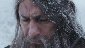 a bearded man in the snow in the film don't close your eyes